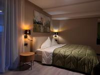 Posteľ alebo postele v izbe v ubytovaní Mountains Hotel