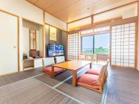 リブマックスリゾートウポポイ白老温泉にあるテレビまたはエンターテインメントセンター