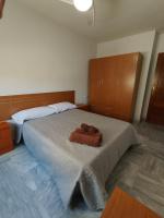 Posteľ alebo postele v izbe v ubytovaní Apartamentos Séneca junto al Centro