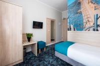 Łóżko lub łóżka w pokoju w obiekcie Hotel Eureka