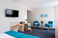 Telewizja i/lub zestaw kina domowego w obiekcie Hotel Eureka