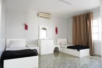 Postel nebo postele na pokoji v ubytování Delta Sharm Chalets