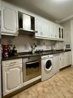 Kuchyň nebo kuchyňský kout v ubytování Apartamento a 10 minutos de la Calle Laurel