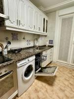 Kuchyň nebo kuchyňský kout v ubytování Apartamento a 10 minutos de la Calle Laurel