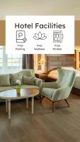 a rendering of a hotel room with a table and chairs at City Hotel Frankfurt Bad Vilbel in Bad Vilbel