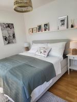 Postel nebo postele na pokoji v ubytování Apartmán v Praze 6, Sedlec