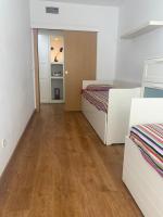 Posteľ alebo postele v izbe v ubytovaní Apartamento Relualhu