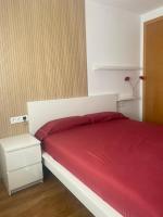 Posteľ alebo postele v izbe v ubytovaní Apartamento Relualhu