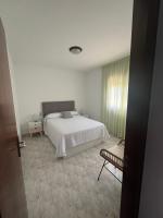 Posteľ alebo postele v izbe v ubytovaní Apartaments Marinera
