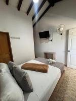 Finca Hotel Zona Francaにあるベッド