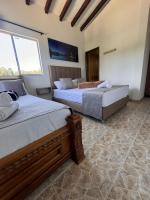 Finca Hotel Zona Francaにあるベッド