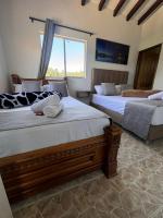 Finca Hotel Zona Francaにあるベッド