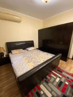 Postel nebo postele na pokoji v ubytování Furnished apartment for rent in sheikh zayed