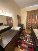 Postel nebo postele na pokoji v ubytování Furnished apartment for rent in sheikh zayed