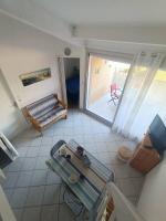 Posedenie v ubytovaní Appartement T2 Cabine, mezzanine Saint Pierre la mer 4oliv41