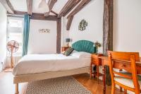 Łóżko lub łóżka w pokoju w obiekcie Appartement tout confort Vieux Tours avec parking privé 4p