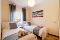 Postel nebo postele na pokoji v ubytování Sea Life Salou Apartment
