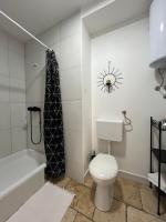 Kúpeľňa v ubytovaní Apartmani N.May's