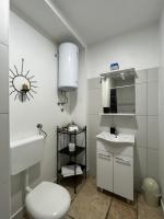 Kúpeľňa v ubytovaní Apartmani N.May's