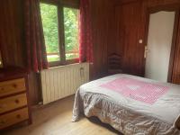 Łóżko lub łóżka w pokoju w obiekcie Chalet Les Airelles