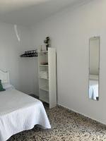 A bed or beds in a room at Alojamientos La Menúa