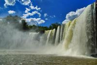 a waterfall in the middle of a body of water at New Center Hotel in Carolina