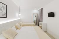 Posteľ alebo postele v izbe v ubytovaní Apartamentos Es Pujols - Emar Hotels
