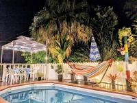Family house プール付オーシャンビュー Amami "Birdland Nature Resort"の敷地内または近くにあるプール