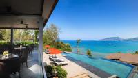 a view of the ocean from a house with a swimming pool at Amari Phuket in Patong Beach