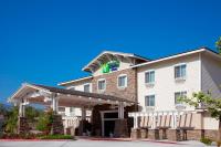 a hotel with a sign on the front of it at Holiday Inn Express Hotel & Suites San Dimas by IHG in San Dimas