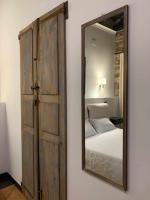Posteľ alebo postele v izbe v ubytovaní C&O Savoia Deluxe Rooms