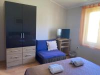Posteľ alebo postele v izbe v ubytovaní Apartments & Rooms Krecak Sibenik