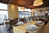 En restaurant eller et andet spisested på Hotel Euròpa Dolomites