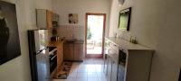 Kuchyň nebo kuchyňský kout v ubytování Holiday Home Kotulin