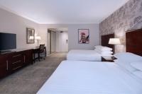 Ein Bett oder Betten in einem Zimmer der Unterkunft Delta Hotels by Marriott Worsley Park Country Club