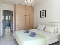 Posteľ alebo postele v izbe v ubytovaní KYMA Apartments - Athens Acropolis 13