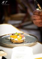 a plate with a sandwich with eggs on it at La Maison Clémenceau in Salon-de-Provence