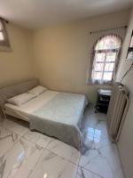 A bed or beds in a room at Ano Poli Studios 3