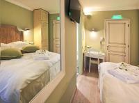 Postel nebo postele na pokoji v ubytování Hotel Doltso