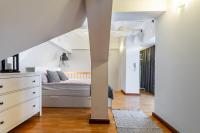 Posteľ alebo postele v izbe v ubytovaní Apartementy Plac Solny 20