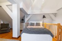 Posteľ alebo postele v izbe v ubytovaní Apartementy Plac Solny 20