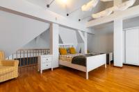 Posteľ alebo postele v izbe v ubytovaní Apartementy Plac Solny 20