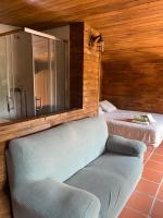 A bed or beds in a room at Casa Hobbit