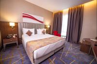 Postel nebo postele na pokoji v ubytování Ramada by Wyndham Istanbul Alibeykoy