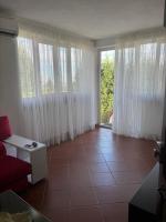 A seating area at VILLA ISELLA