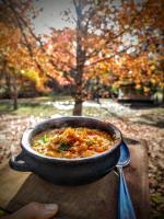 a pan of food sitting on top of a table at Viva el Delta in Tigre