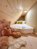 Postel nebo postele na pokoji v ubytování Boutique Cottage Tkalcovna