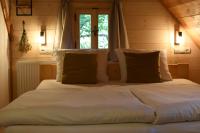 Postel nebo postele na pokoji v ubytování Boutique Cottage Tkalcovna