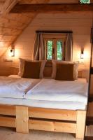 Postel nebo postele na pokoji v ubytování Boutique Cottage Tkalcovna