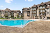 Bazén v ubytovaní La Résidence du Golf - maeva Home - Appartement 2 pièces 5 personnes - Confort MAE-5442 alebo v jeho blízkosti